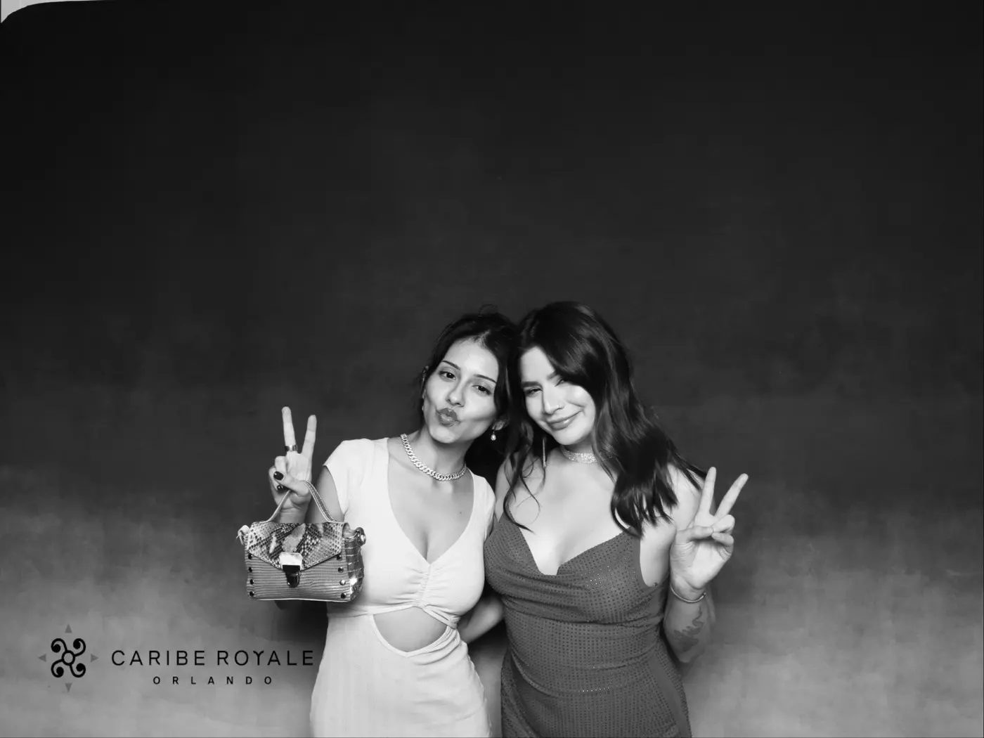 Guests celebrating together in the Caribe Royale holiday party photo booth
