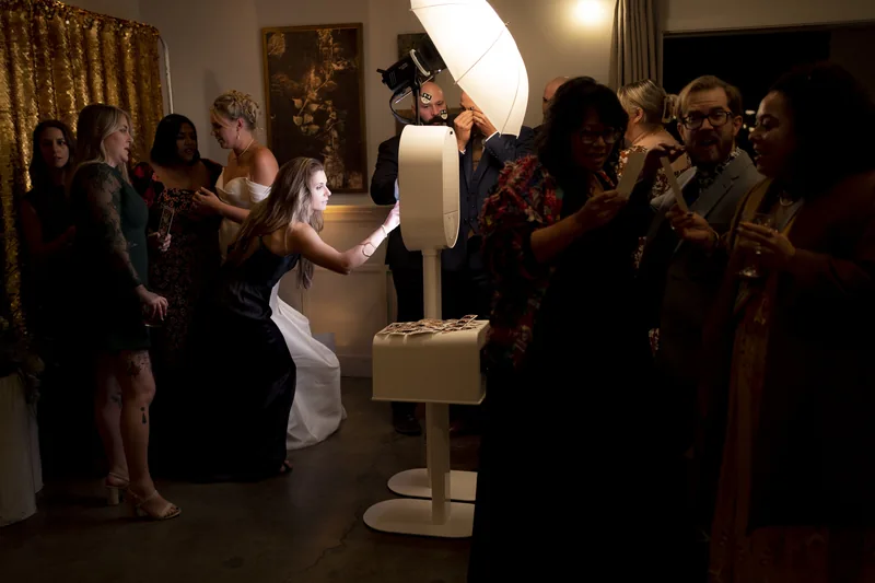 Pro DSLR photo booth setup with guests at an Orlando event